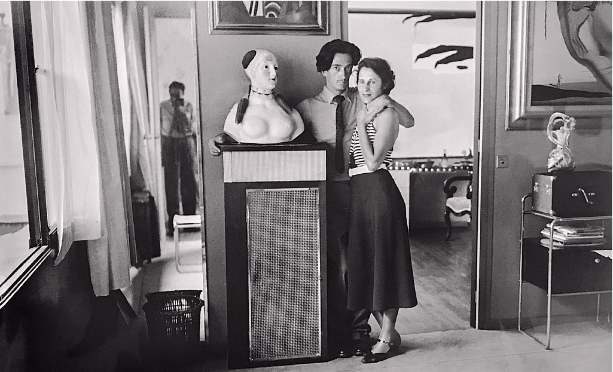 Salvador Dali at Villa Seurat with his wife Gala, in a modernist room.