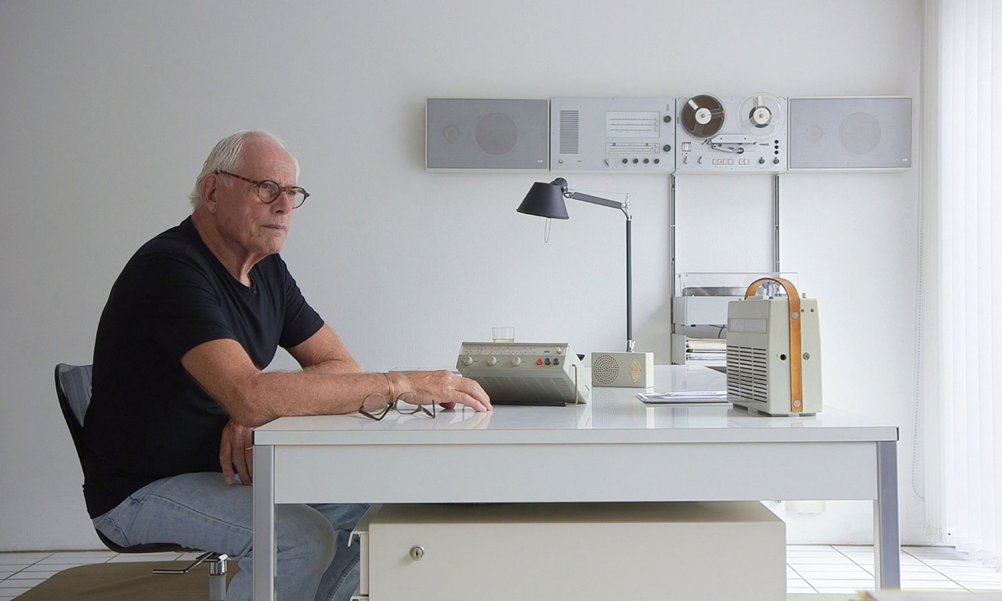 Dieter Rams in his home, surrounded by objects of his own design.