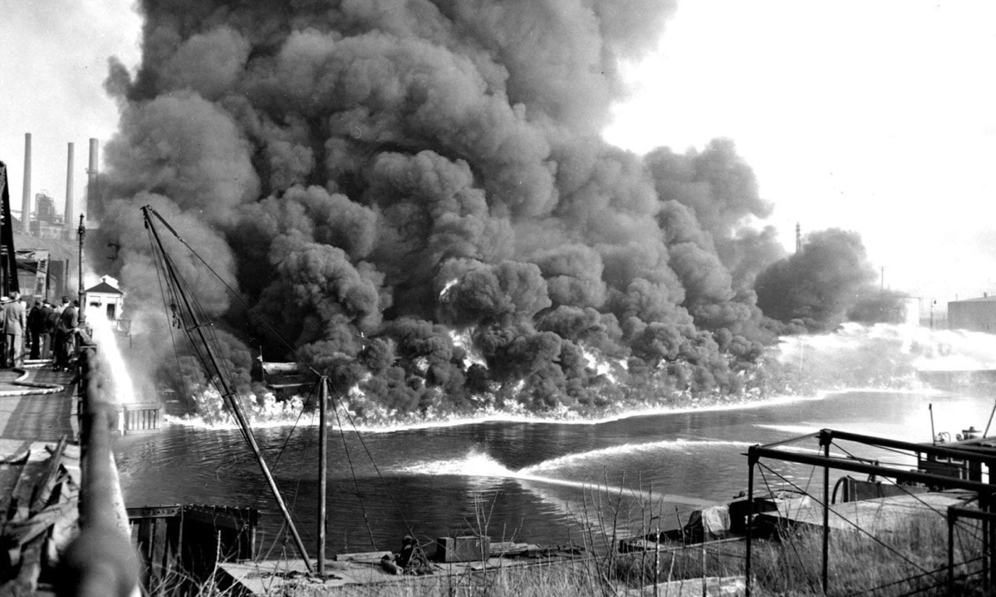 In 1969, the heavily polluted Cuyahoga River caught fire in Cleveland, Ohio. Image via the Cleveland State University Library.