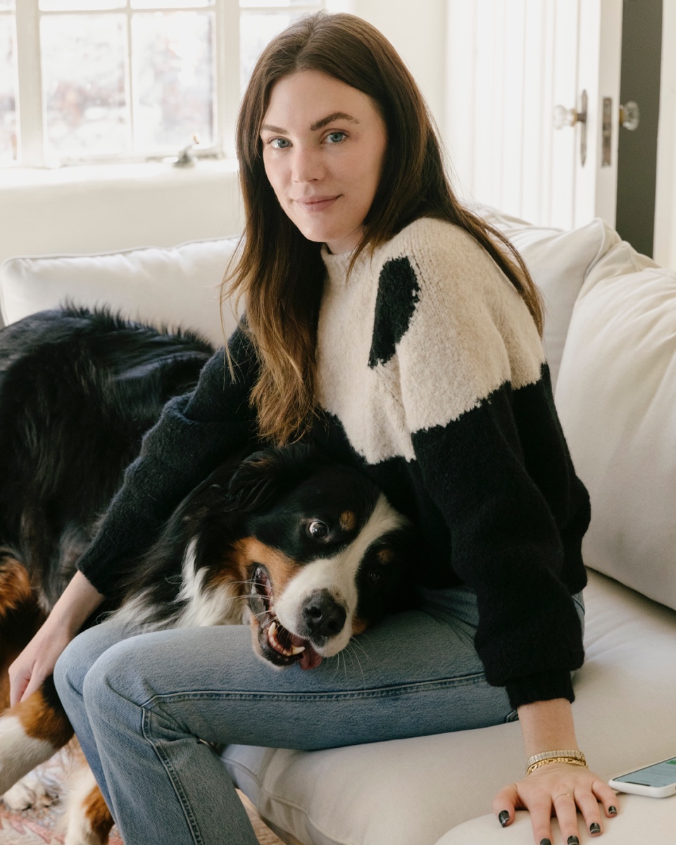 Madelynn with her dog Benny on the Floyd Sofa in Oat. It is merely coincidental that he matches the decor.