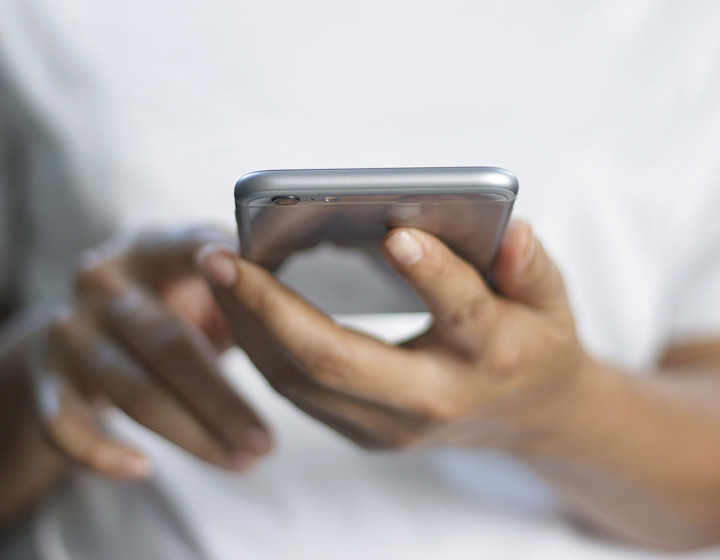 closeup-hands-phone-1440x1120.jpg