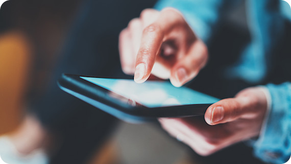 close up of person using mobile device