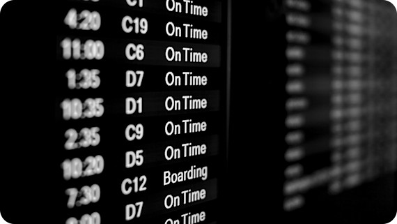 airline flight monitor showing landing times