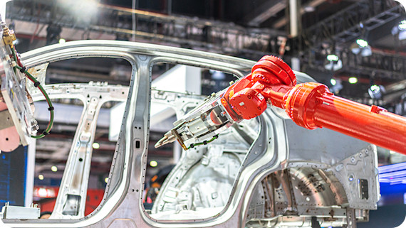 Robot arm working in car factory.