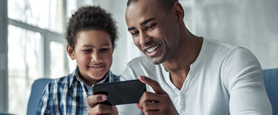 man-son-looking-at-phone-400x165