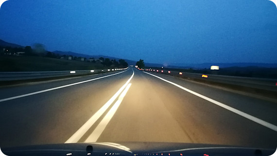 view-windshield-road-dusk-870x490