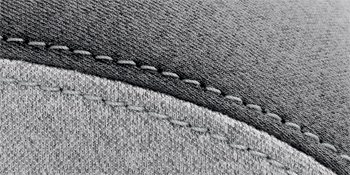 Tissu gris bicolore avec coutures grises