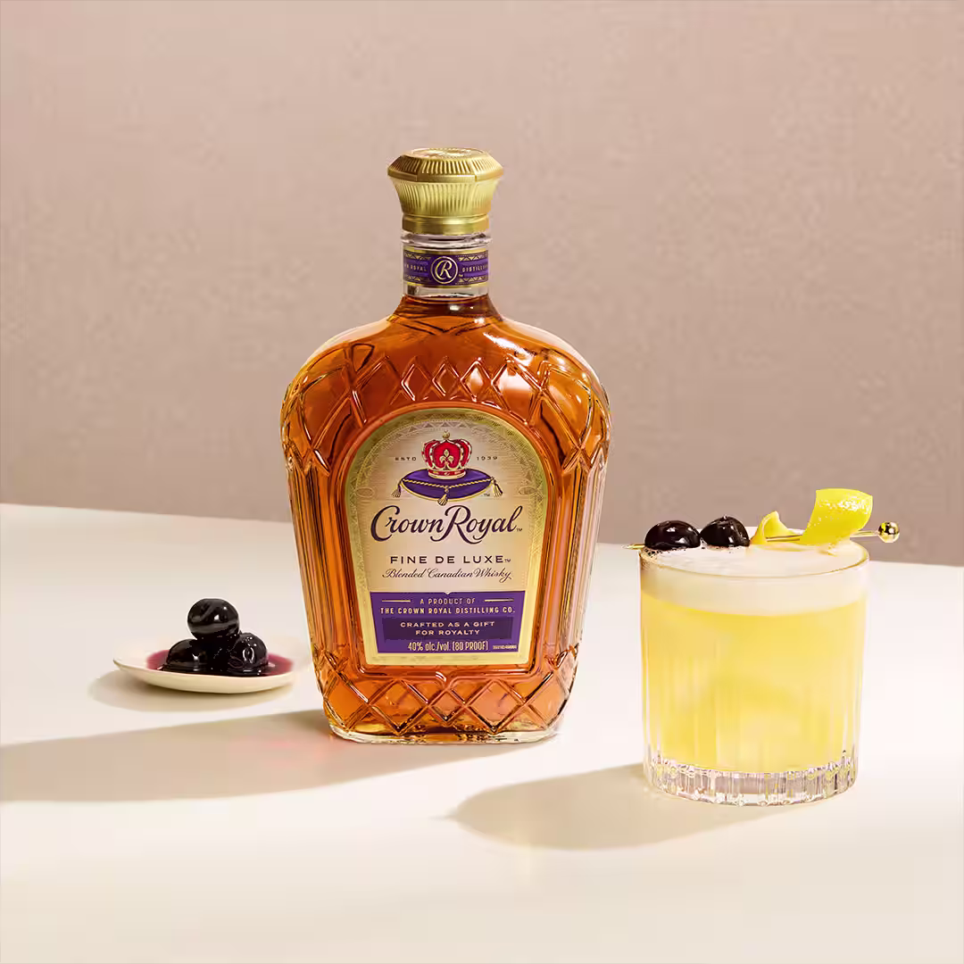 Try our Whisky Sour recipe with Crown Royal Deluxe® Whisky, lemon juice, simple syrup and an egg white.