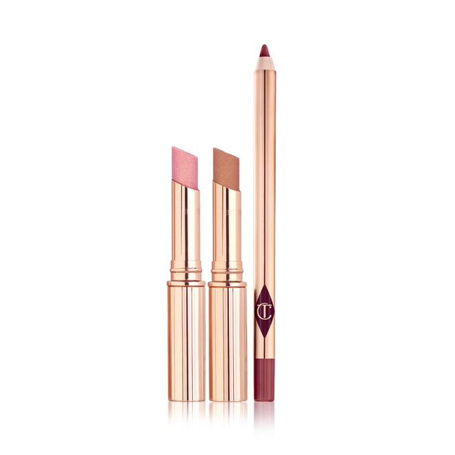 Two, open shimmery lipsticks in sheer pink and nude coppery-bronze colour with a lip liner pencil in a brownish-maroon colour.