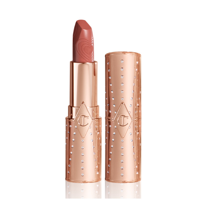 Two lipsticks, with and without lid, in a  universally flattering peachy-nude shade with gold-coloured packaging.