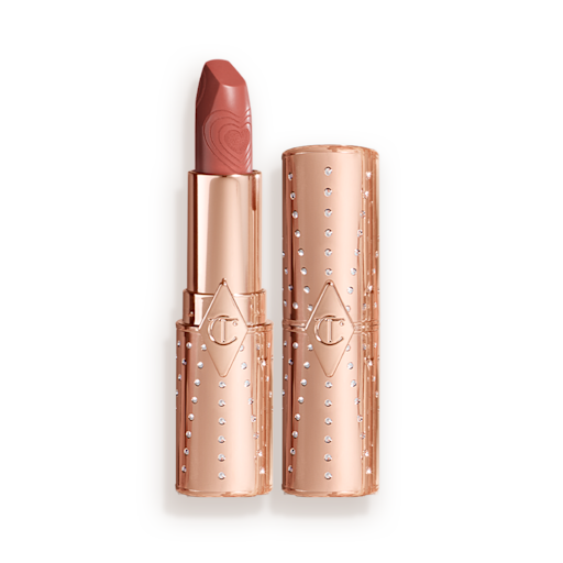 K.I.S.S.I.N.G in Nude Romance with and without lid Two lipsticks, with and without lid, in a universally flattering peachy-nude shade with gold-coloured packaging.