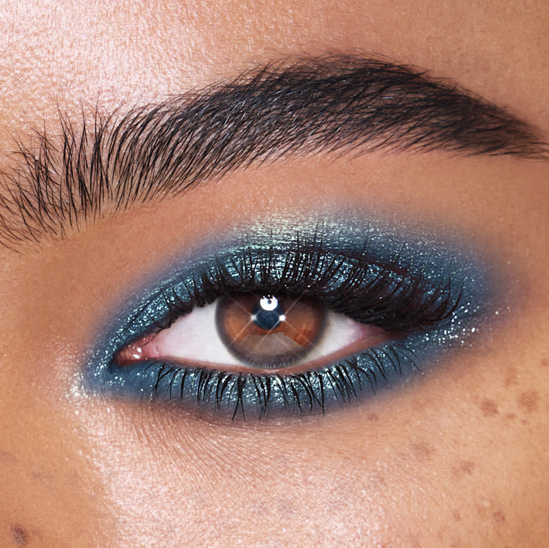 Blue eyeshadow for brown eyes Model with brown eyes wearing Cosmic Rocks blue eyeshadow look