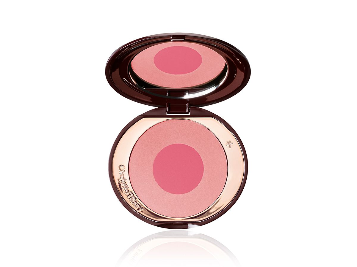 Cheek to Chic in Love is The Drug open AN open, mirrored-lid two-tone blush in warm pink and magenta.