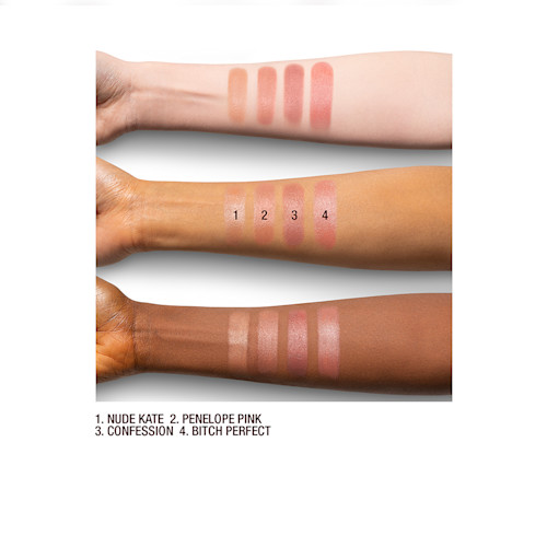 K.I.S.S.I.N.G. nude shades arm swatches Fair, tan, and deep-skin arm swatches of satin-finish lipsticks in various nude shades.