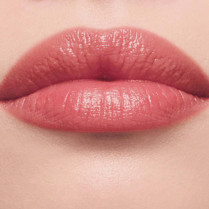 Blushed Rose lip tint on fair skin close up Blushed Rose lip tint on fair skin close up