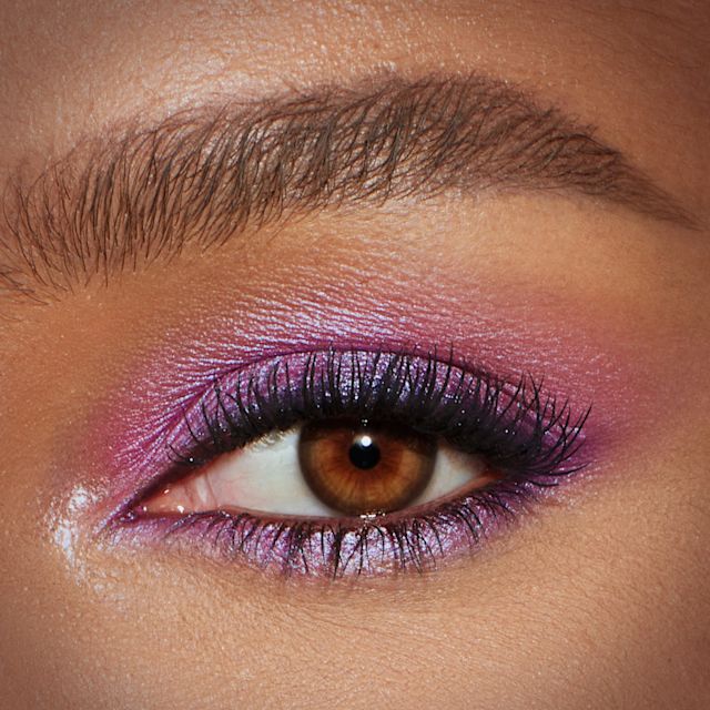 Duochrome Violet Eyeshadow Look Model eye close up wearing a duochrome violet eyeshadow makeup look using Pillow Talk Ultraviolet Hypnotising Pop Shot