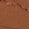 Beautiful Skin Sun-Kissed Glow Bronzer in Tan swatch Swatch of a hydrating cream bronzer in a dark-brown shade.