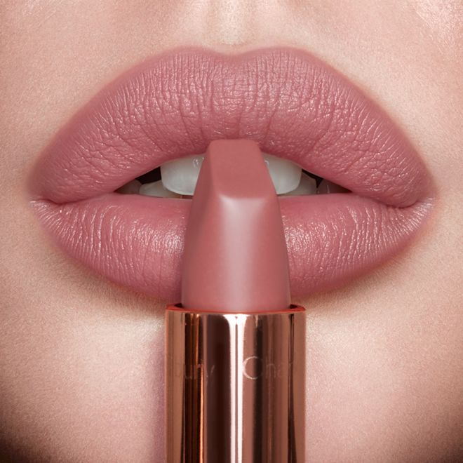 Pillow Talk Original Lipstick lip swatch Model wearing Pillow Talk Original Matte Revolution nude-pink lipstick
