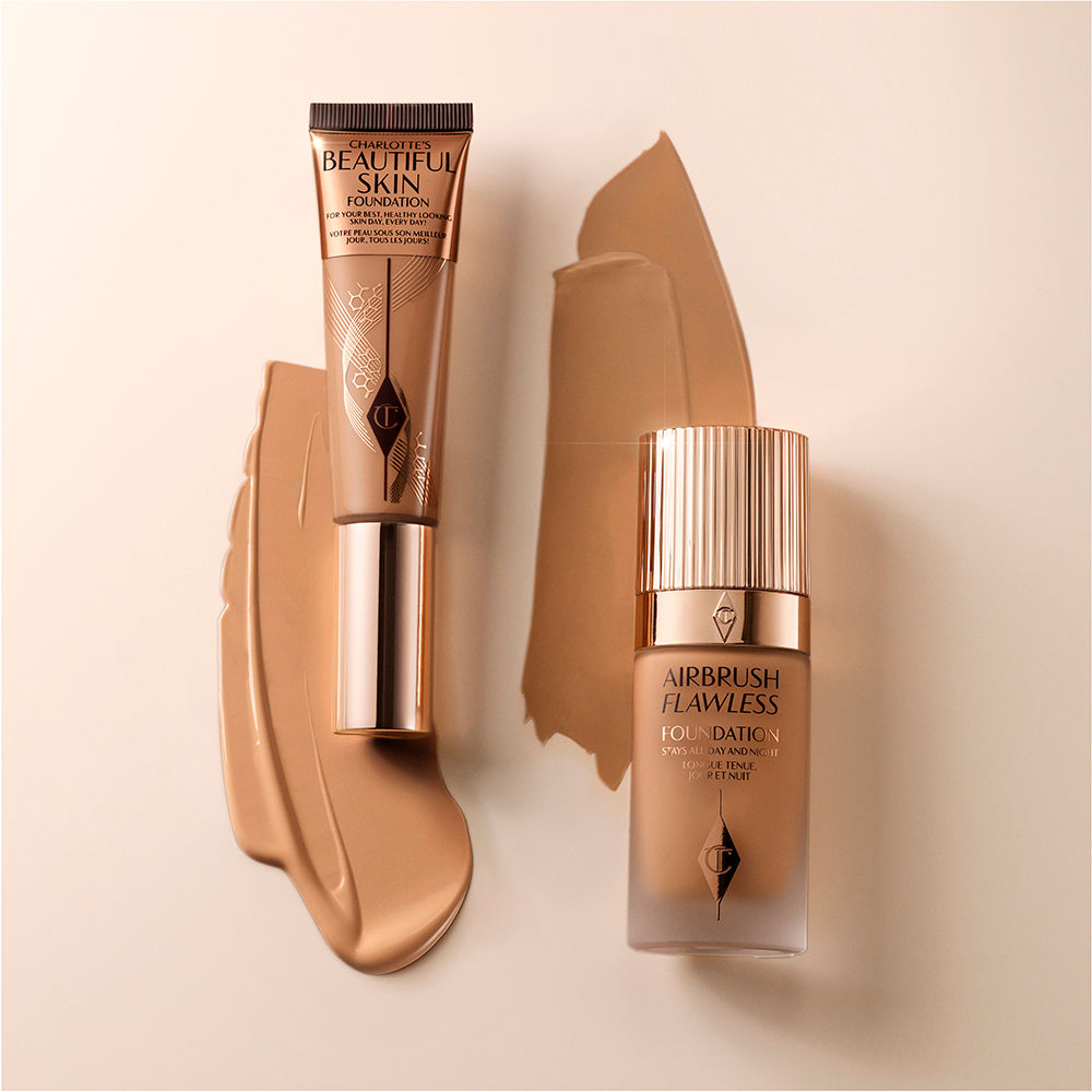 Foundation Swatch still life Swatches of Beautiful Skin Foundation and Airbrush Flawless Foundation showing their hydrating liquid formulas