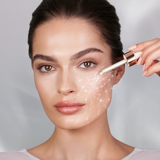 Magic Serum Crystal Elixir on fair-skin model A fair-tone brunette model applying a pearlescent serum with a dropper on her face.