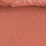 Matte Revolution in Super You swatch Close-up swatch of a warm, peachy-nude matte lipstick.