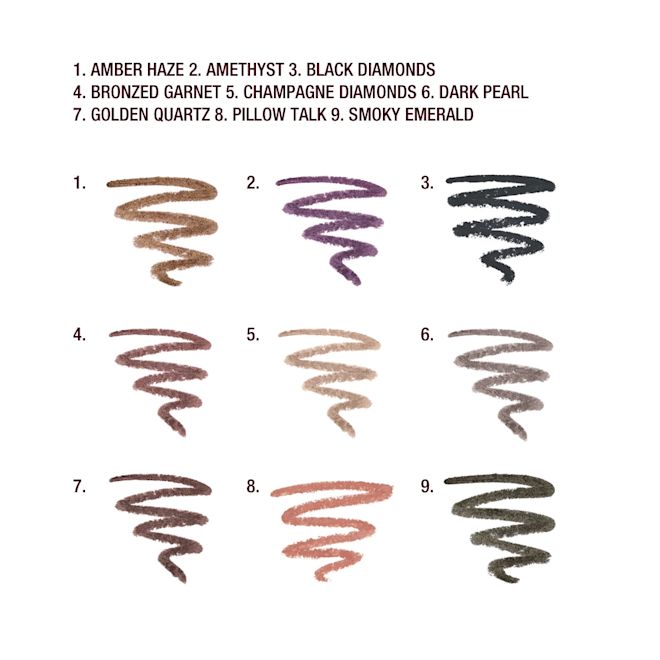 Colour Chameleon swatches Swatches of nine eyeshadow sticks in amber, smokey red, black, champagne, dark green, grey, dark purple, golden-brown, and smokey green.