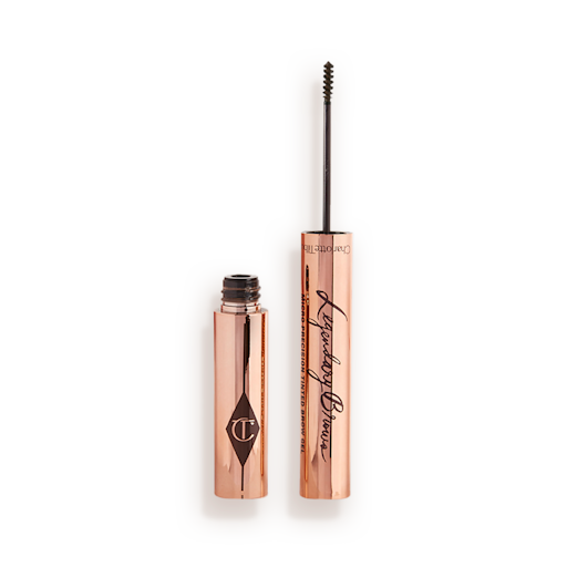 Legendary Brows Eyebrow gel in Dark Brown open Open, tinted brow gel in a dark brown shade with a thin brush for precision, and a shiny, gold-coloured tube.