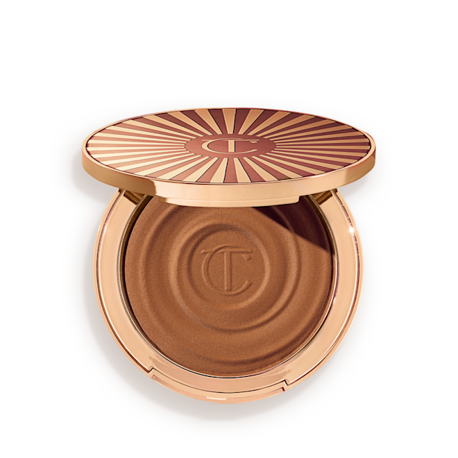 Beautiful Skin Sun-Kissed Glow Bronzer in Medium open Open, cream bronzer compact in a medium-brown shade with gold-coloured packaging.