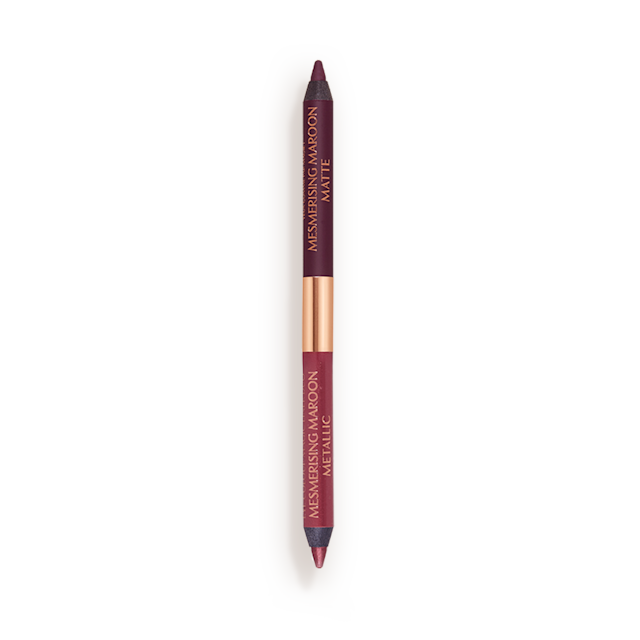 Eye Colour Magic Liner Duo in Mesmerising Maroon A double-ended eyeliner with lids removed with one side a bright maroon and the other a rich violet.