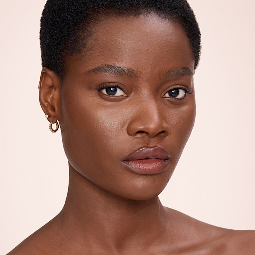 Airbrush Flawless Concealer - 14 Deep model after Airbrush Flawless Concealer - 14 Deep model after