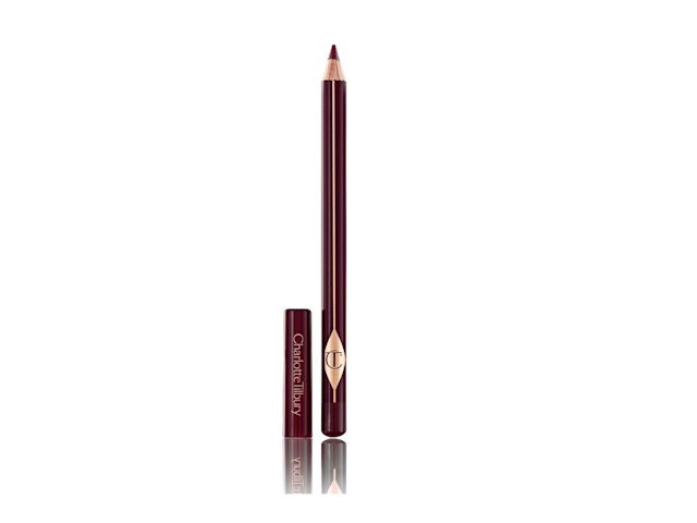 The Classic Eyeliner In Shimmering Brown open An open eyeliner pencil in a shimmery dark brown shade with its cap next to it.