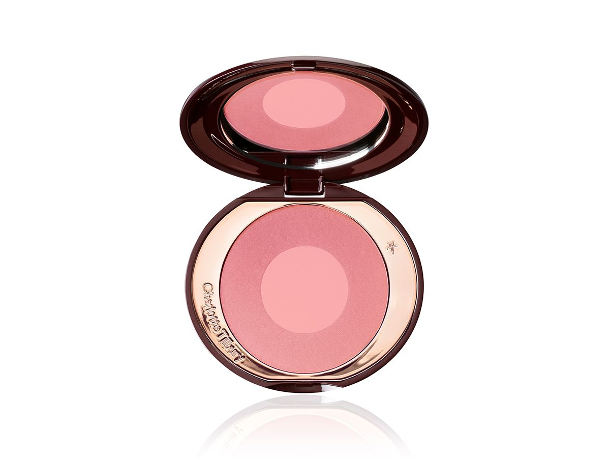 Cheek To Chic in Love Glow open An open, mirrored-lid two-tone blush in warm pink and light peach-pink.