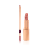 An open lip liner pencil in a nude pink shade and and open lipstick in a muted pink shade.