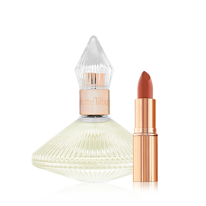 Scent of A Pillow Talk Dream Kit A 100 ml perfume in a glass bottle with a glass lid with an open lipstick in a peachy-red shade in a golden-coloured tube.