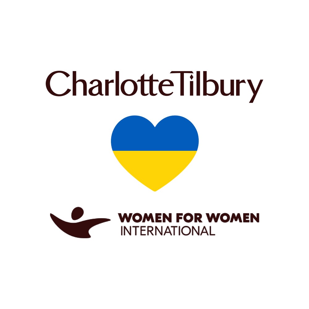 Banner with a heart, in the colour of the Ukrainian flag with text in the bottom that reads, 'women for women international'