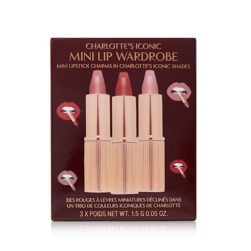Charlotte's Iconic Mini Lip Wardrobe packed A dark brown coloured-box with three lipsticks inside in nude pink, pale pink, and berry-rose.