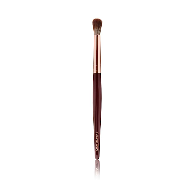 Eye Blender Brush An eyeshadow and eyeliner brush in a golden and dark crimson colour scheme.