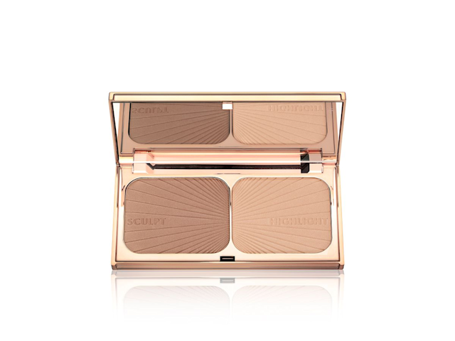 Filmstar Bronze and Glow open An open, mirrored-lid duo contour palette for light to medium skin tones in sleek rose-gold-coloured packaging.
