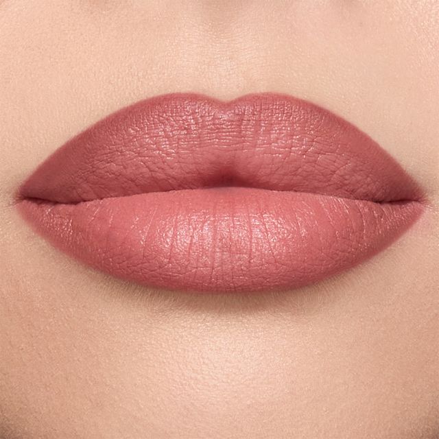 Pillow Talk Medium Lip Cheat close up Model wearing Pillow Talk Medium Lip Cheat to overdraw their lip shape