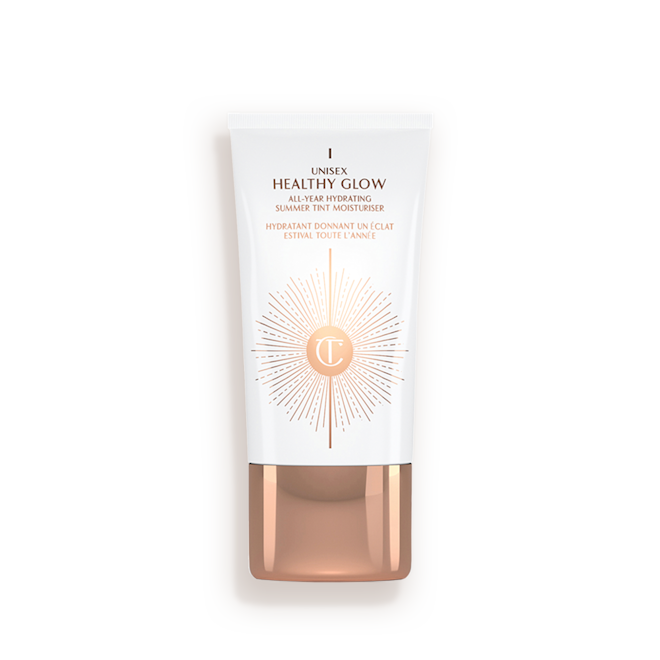 Unisex Healthy Glow Closed White rectangle bottle with a rose gold lid.