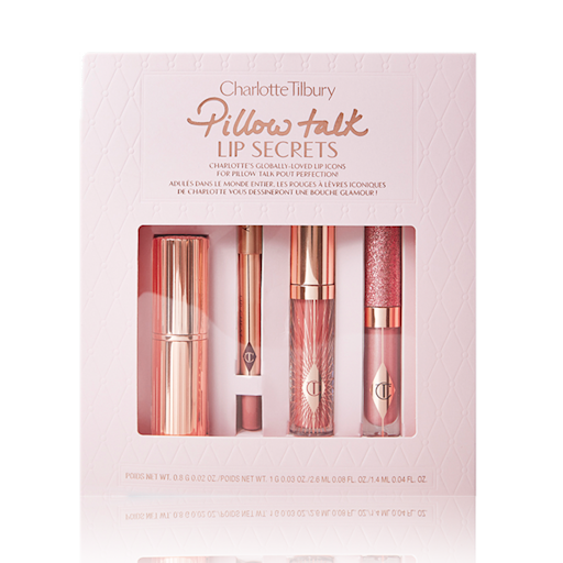 Pillow Talk Lip Secrets kit packed Lipstick in gold packaging, nude pink lip liner, nude pink glitter-free lip gloss, and glittery nude pink lip gloss packed in a nude pink box with Pillow Talk Lip Scerets written on it.