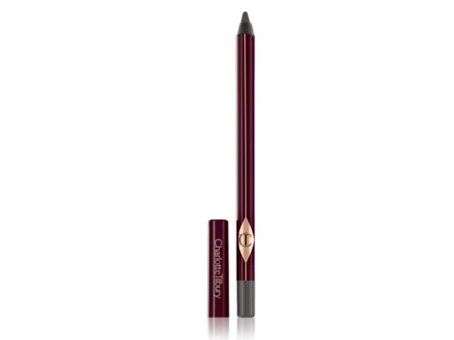 Rock n Kohl in Smokey Grey open A kohl pencil in a smokey grey shade with its lid next to it.