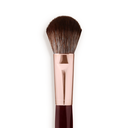 Synthetic Bronzer And Blush Brush close-up Close-up of a bronzer and blush brush with dark brown and grey bristles with a rose-gold and dark crimson handle.