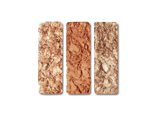 Bejewelled Eyes to Hypnotise swatches Swatches of three eyeshadows in bright topaz, light gold, and dark brown shades.