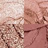 Bigger Brighter Eyes in Exagger-Eyes swatches Close-up swatches of four shimmery and matte eyeshadows in shades of cream, pink, gold, and red clay.