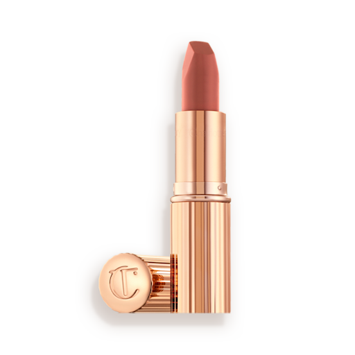 Matte Revolution Lipstick in Supermodel open An open, mid-toned muted nude-rose matte lipstick, in sleek, gold-coloured tube.