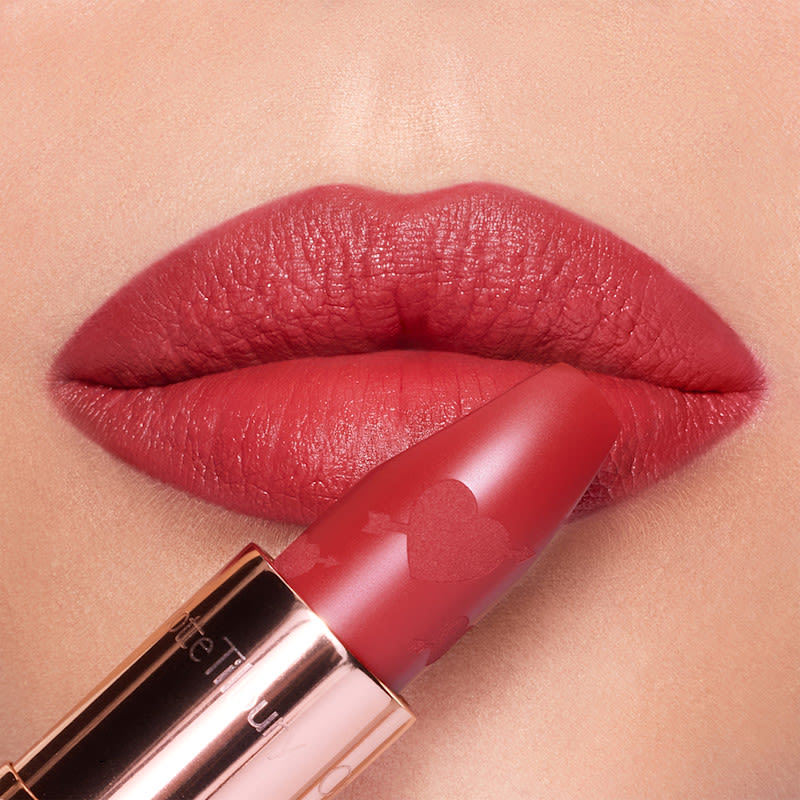 Love Talk lip close up Love Talk red lipstick close up on fair skin