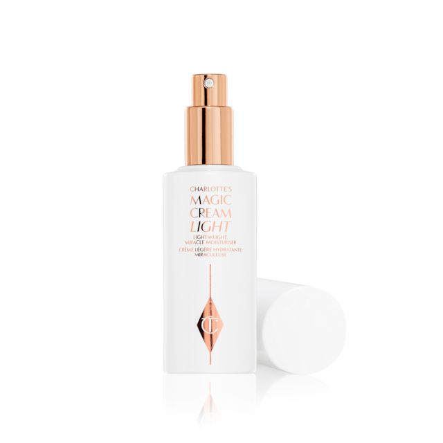 Magic Cream Light Packshot for blog Charlotte's Magic Cream Light white and rose gold moisturiser bottle with pump