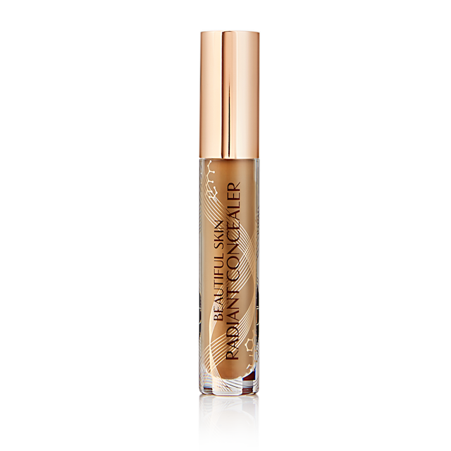 Beautiful Skin concealer closed Radiant concealer in a glass tube with a gold-coloured lid with text on the tube that reads, 'Beautiful Skin Concealer'