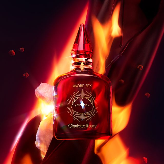 More Sex art More Sex fragrance bottle artwork with fire backdrop